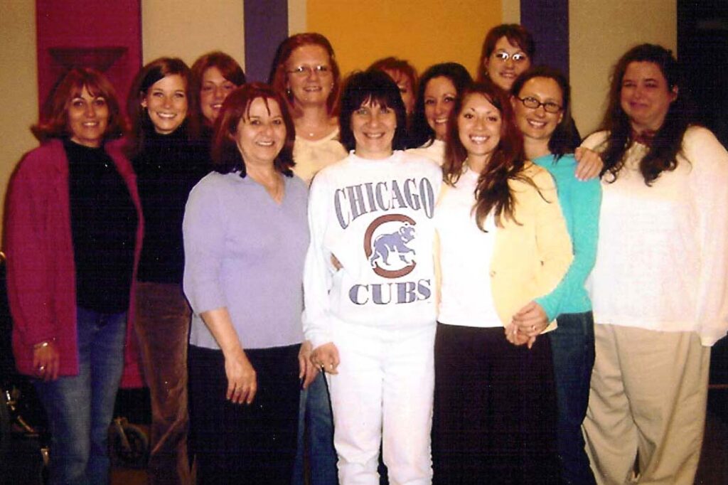 Of course, the one night I go casual with my favorite Cubs sweatshirt, they decide to take a group photo! (2006)